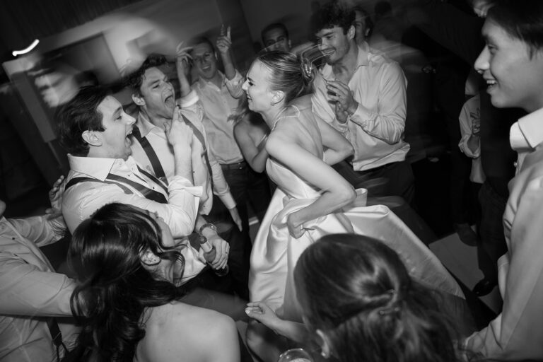 Blurry wedding dance photos at the reception in black and white